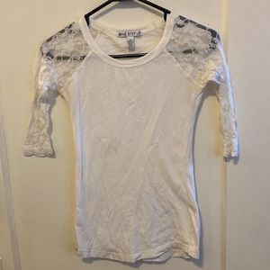 White T shirt with lace sleeves.